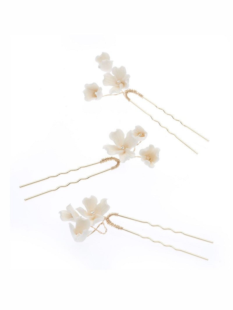 Tocado de novia con flores en porcelana